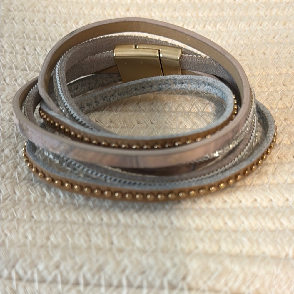 Wrap around bracelet, gold and silver on taupe